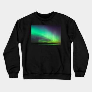 Northern lights over lake in Finland Crewneck Sweatshirt